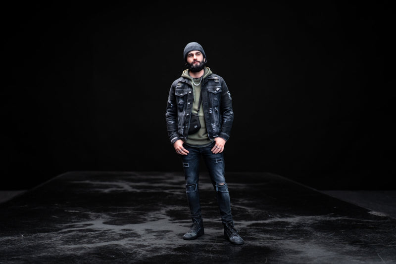 Full-color 3D printed figurine of a man in a beanie and denim jacket