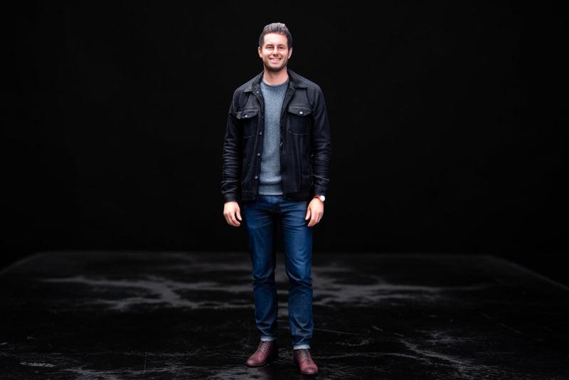 Full-color 3D printed figurine of a man in a black jacket and jeans